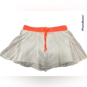 NWT FREE PEOPLE MOVEMENT white/coral skort. Size medium